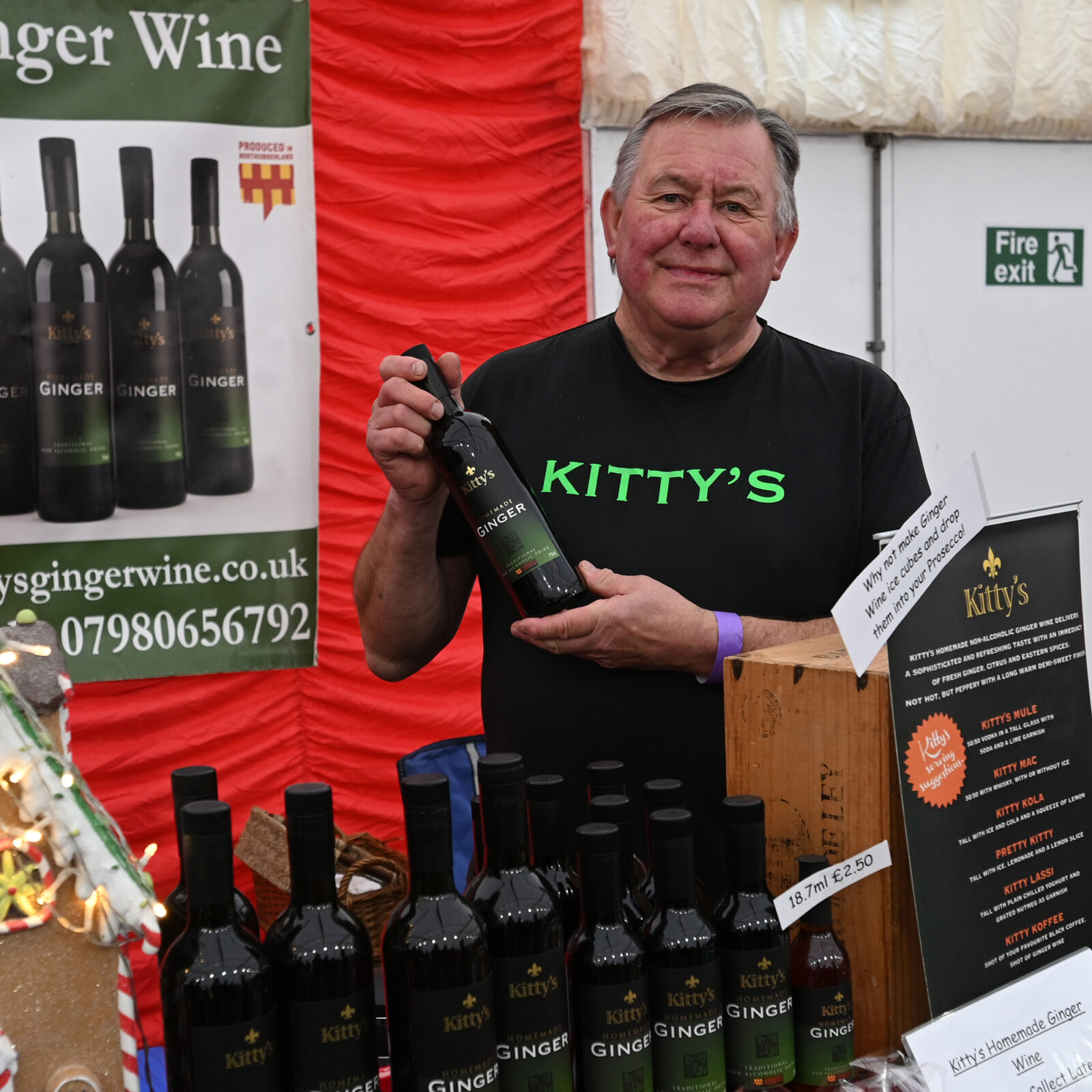 A man selling Kitty's Ginger Wine