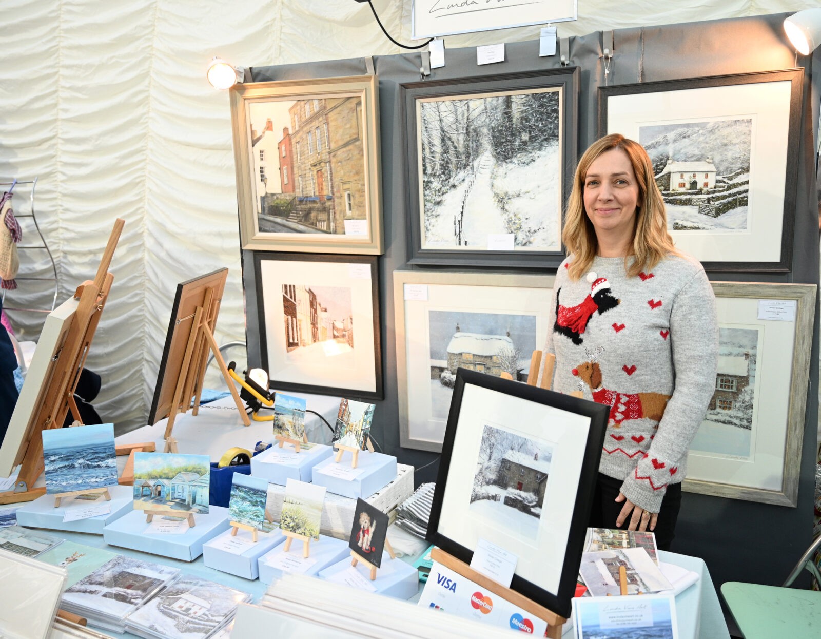 A lady selling artwork