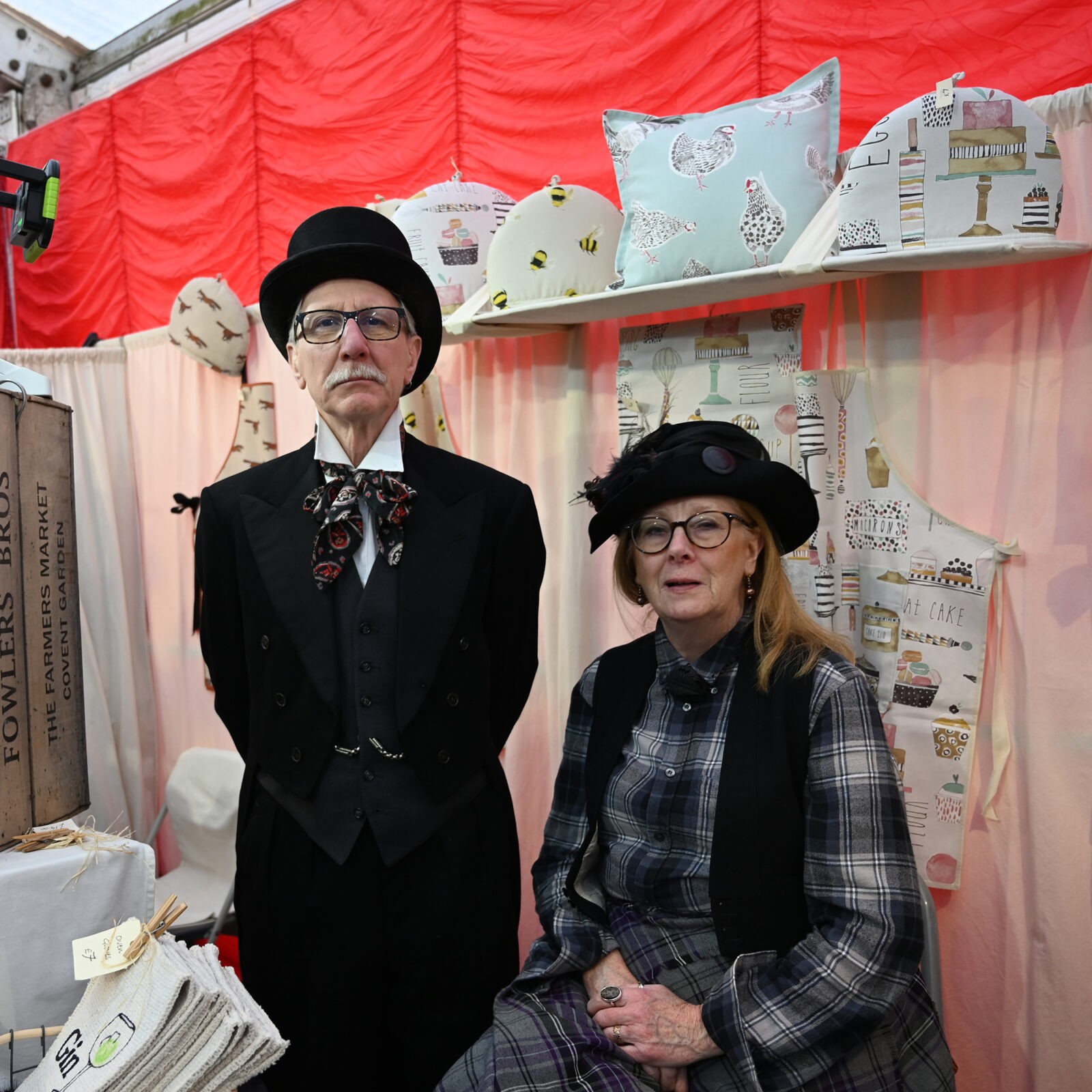 Two people in old fashioned clothing