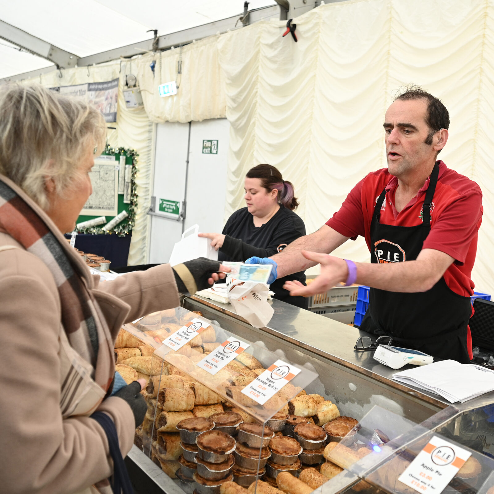 A man selling pies