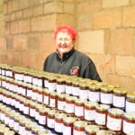 A lady selling condiments
