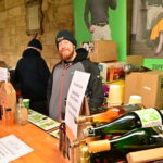 A man selling cider