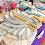 A display of woolly hats and gloves