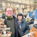 A couple selling jewellery and Christmas decorations