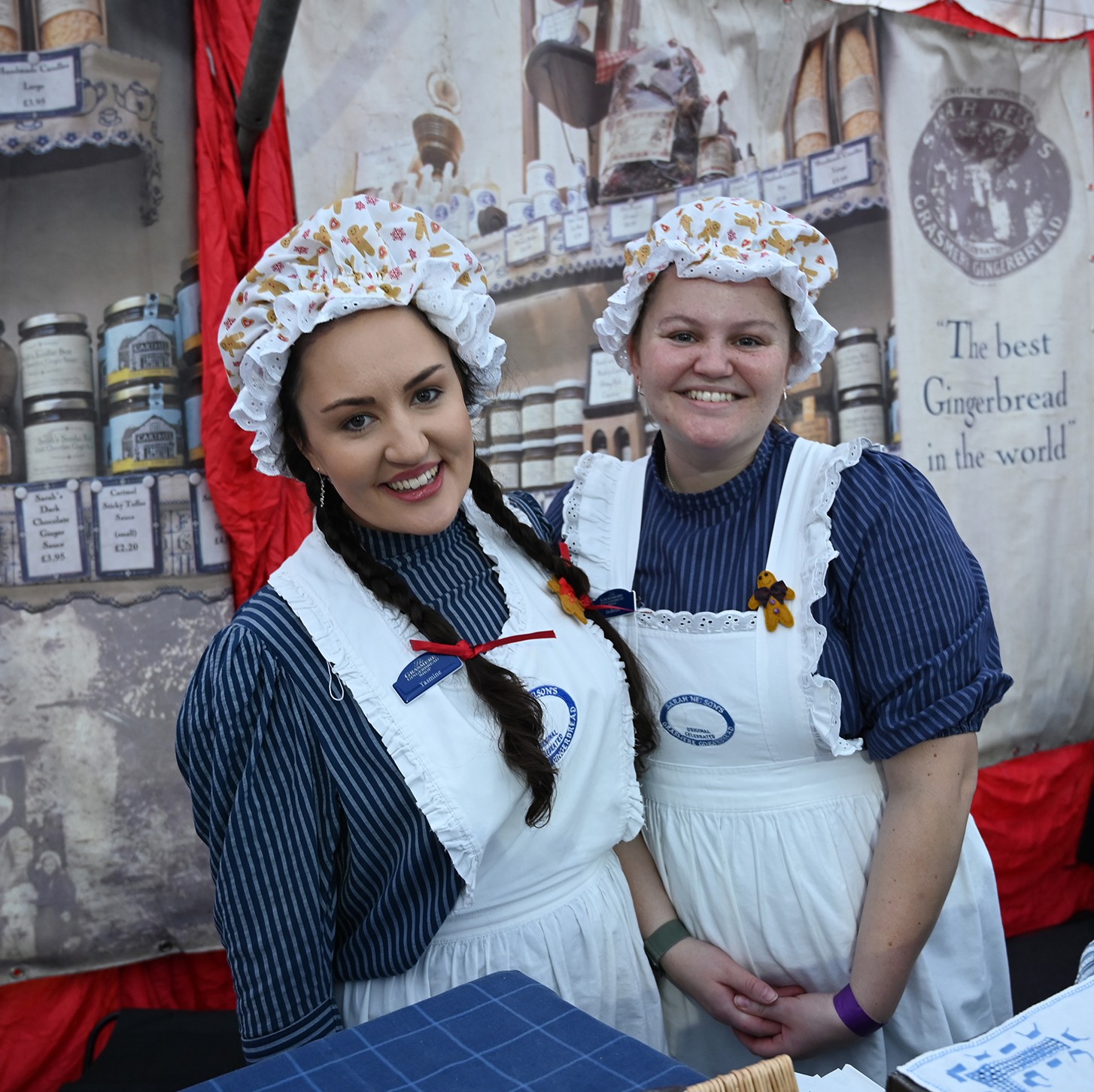Two ladies in old fashioned clothing
