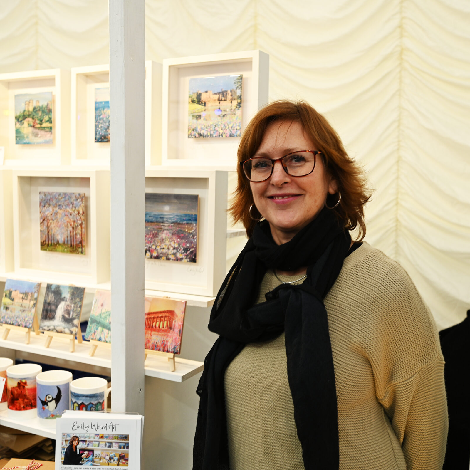 Emily Ward showing her artwork