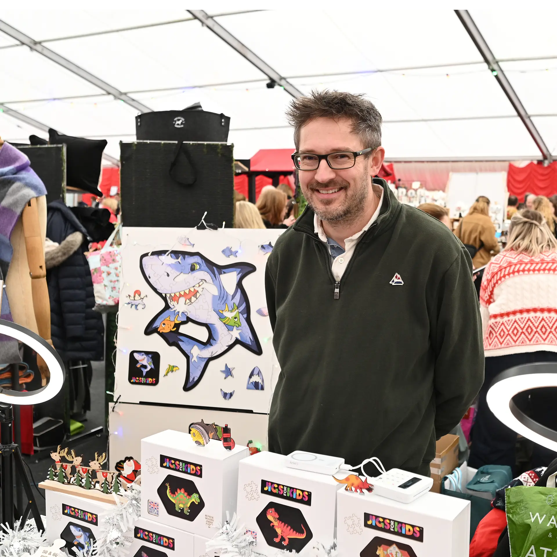 A man selling children's jigsaws