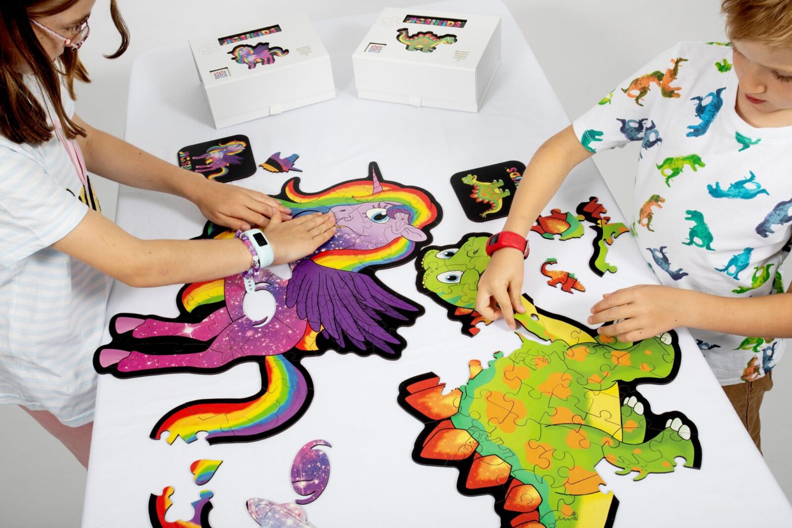 Children completing jigsaws