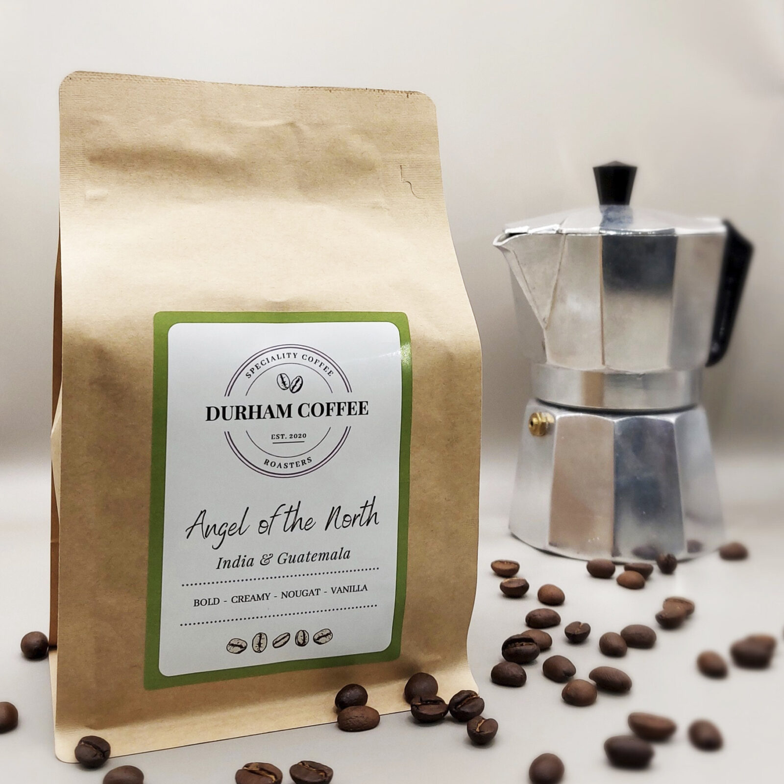 A packet of Durham Coffee and a coffee percolator